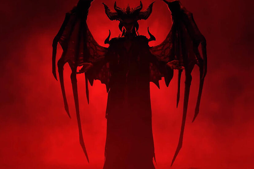 Demonio rojo con alas y cuernos en un lugar oscuro